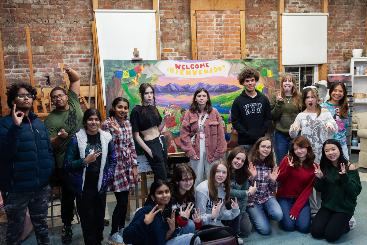 The Kirkland MAP cohort designed and painted a mural at the Kirkland Arts Center with Teaching Artists Carmel Mercado and Charles Conner guiding the process. This mural will soon welcome visitors to the Center for Human Services' Substance Use and Family Support Departments.